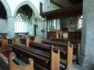Pews in the church of Alemely.